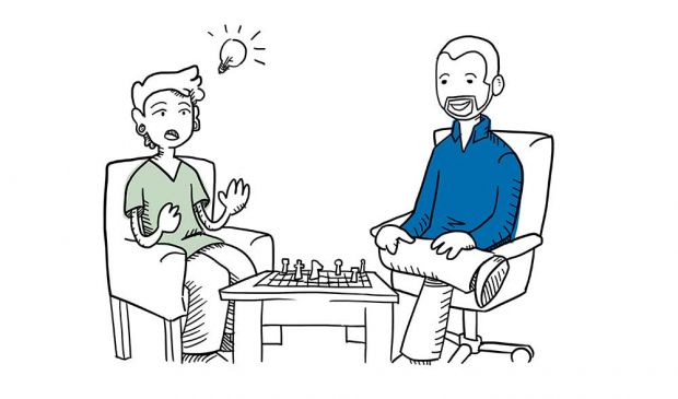 teenager playing chess with teen counselor