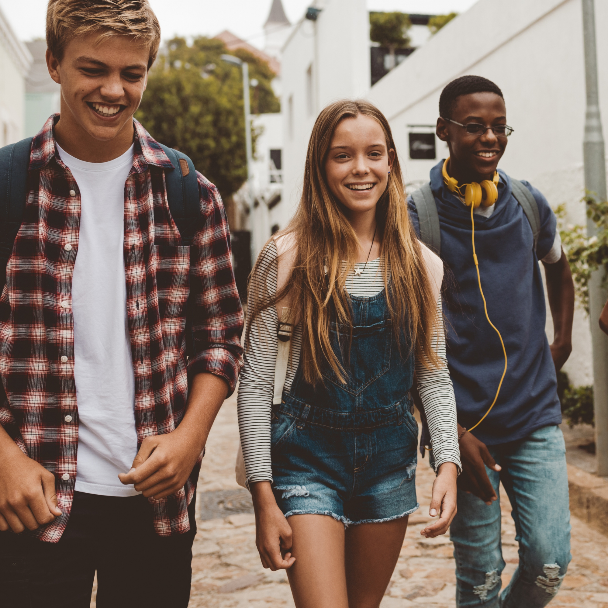 teens walking and laughing after school